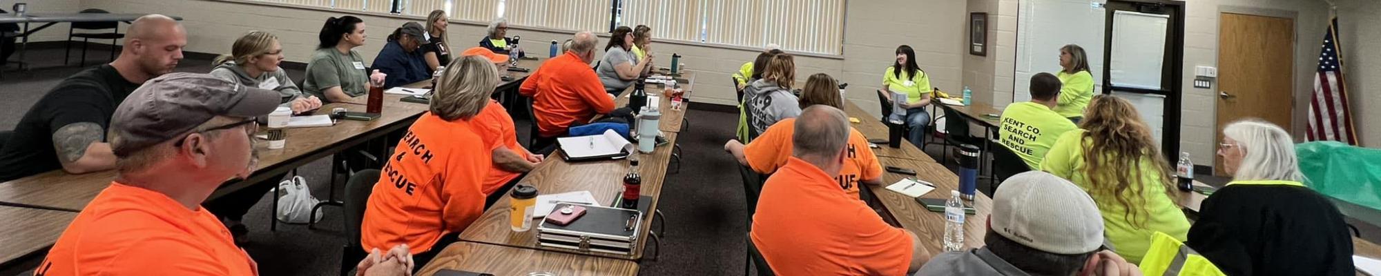 people sitting as workshop tables